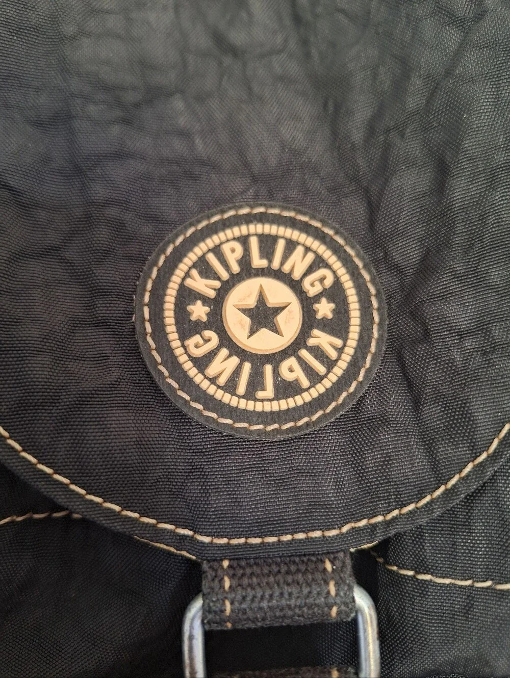 Kipling Black Canvas Drawstring Backpack with Handle And Front Zip Pockets